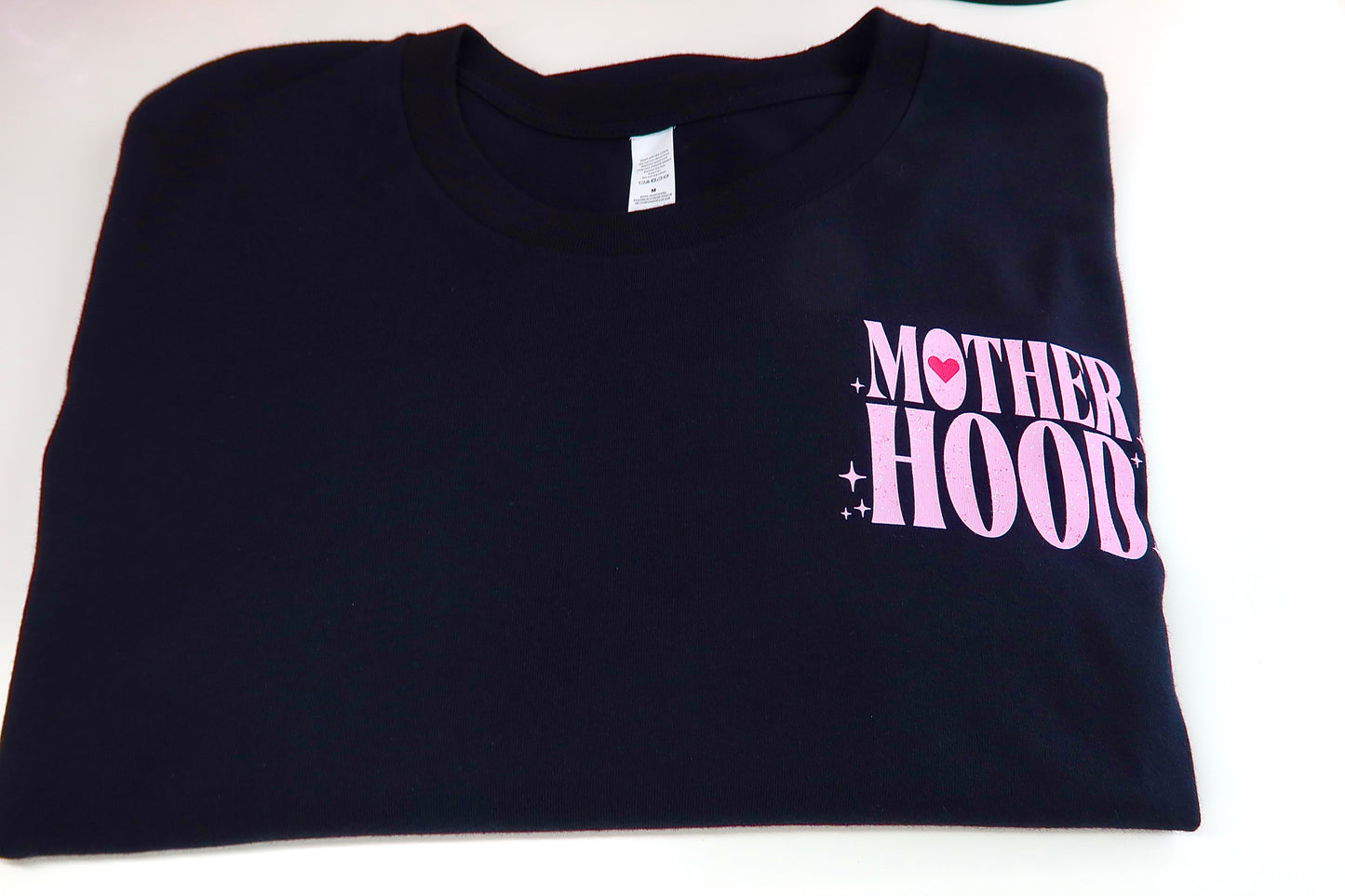 Motherhood Some Days I Rock It Some Days It Rocks Me Either Way We're Rocking in Black Tee