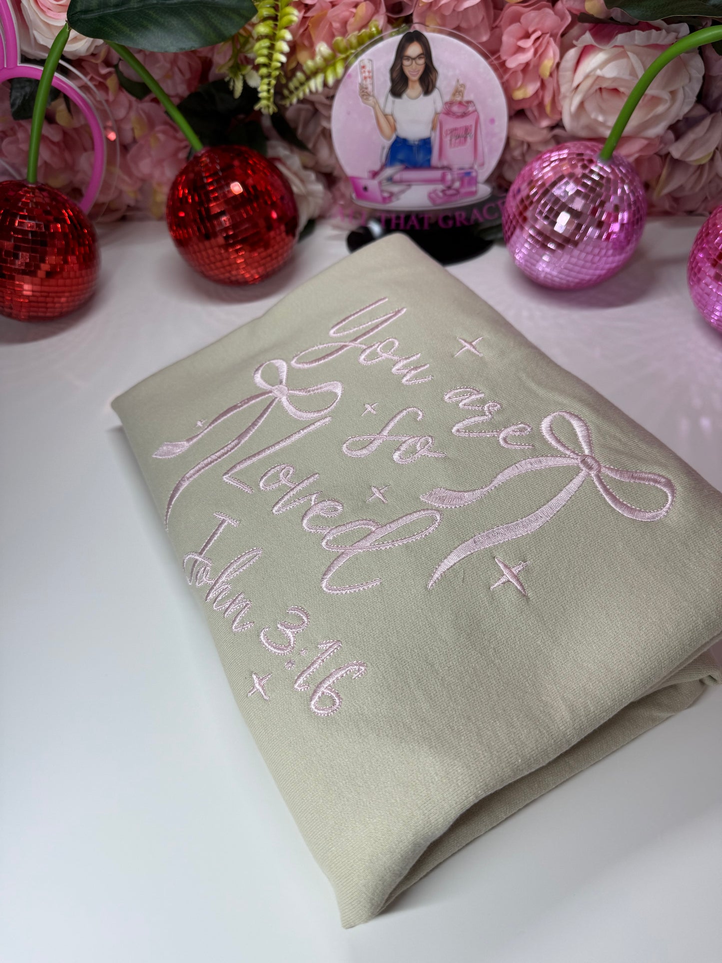 You Are So Loved John 3:16 Cream Bow Embroidered Crewneck In Light Pink Stitching