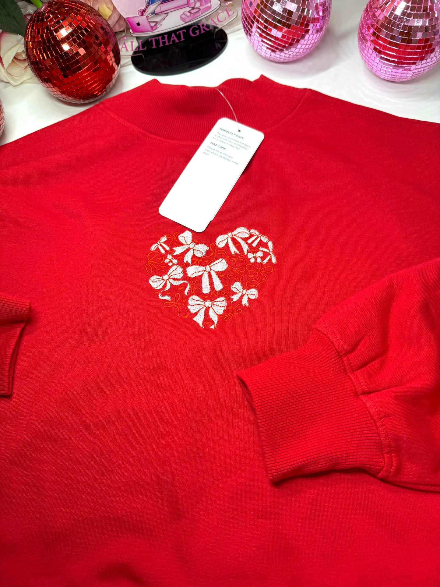 Heart Shaped Bow Embroidered Mock Neck Sweater in Red