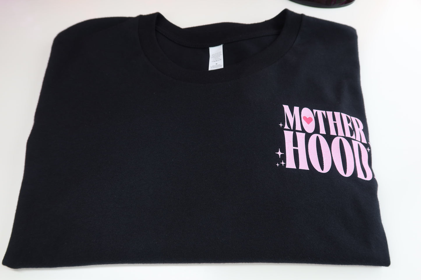 Motherhood Some Days I Rock It Some Days It Rocks Me Either Way We're Rocking in Black Tee