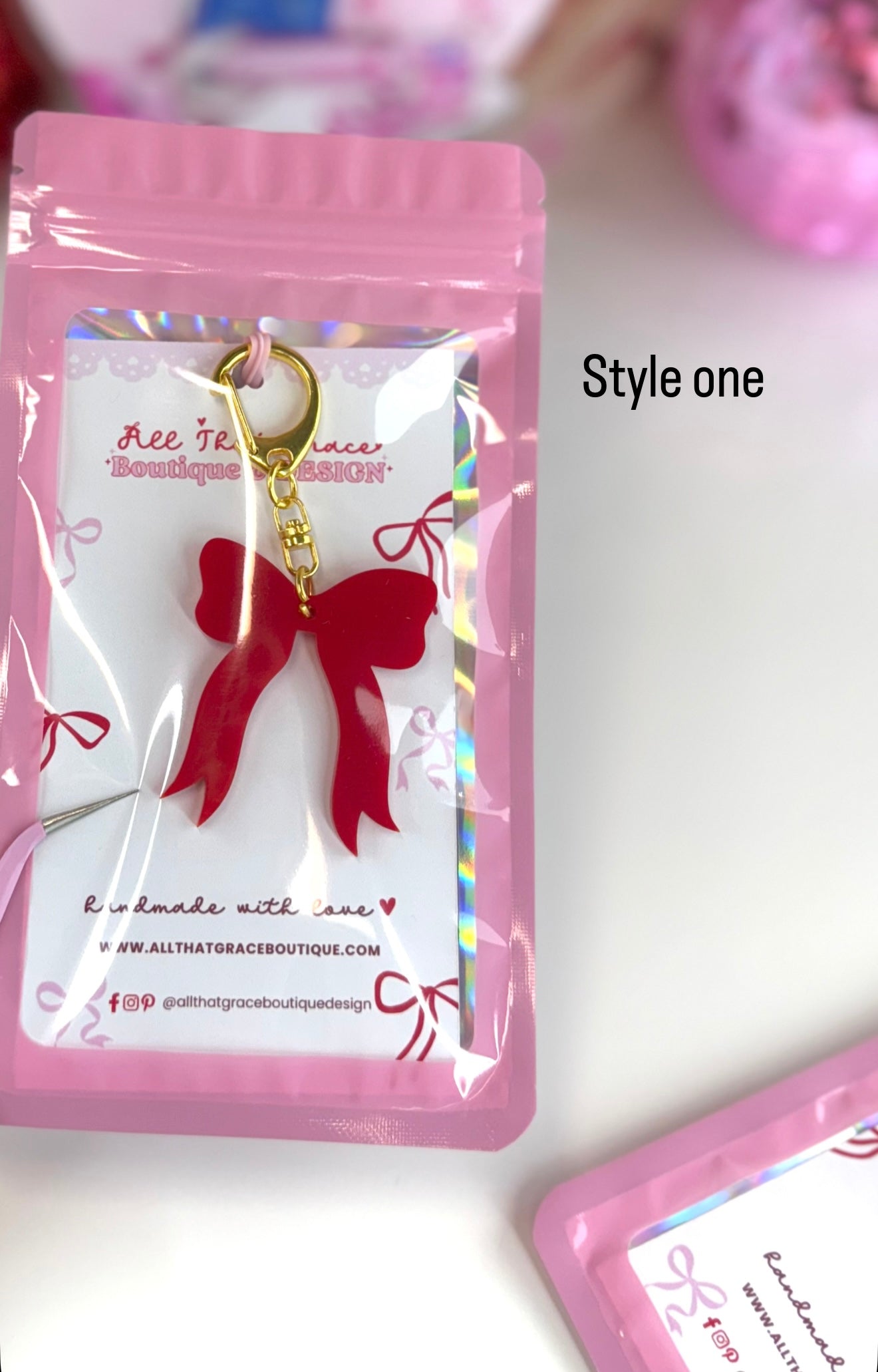 Red Acrylic Bow Keychain with Gold Hardware